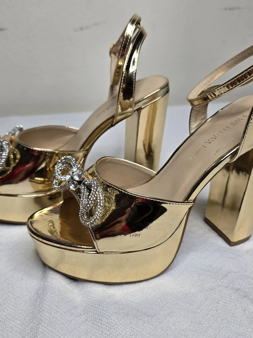 Gold Platform Sandals with Crystal Bow Accent